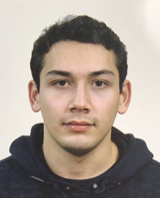 Headshot of Dom Chomchai